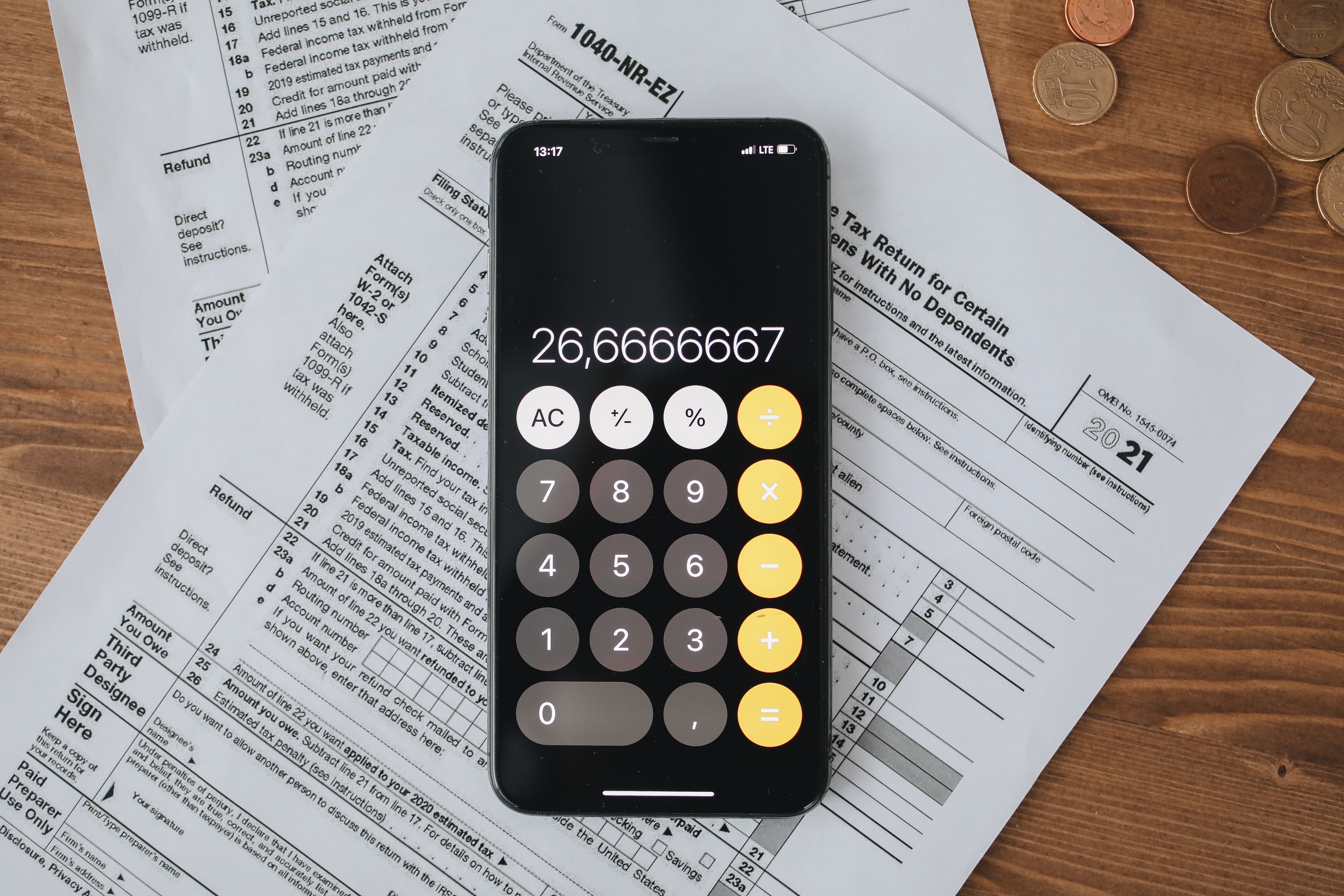 Calculator and tax paperwork, representing UK gambling duty calculations